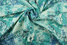 Load image into Gallery viewer, This fabric features a abstract design in blue, turquoise, gray, and teal.
