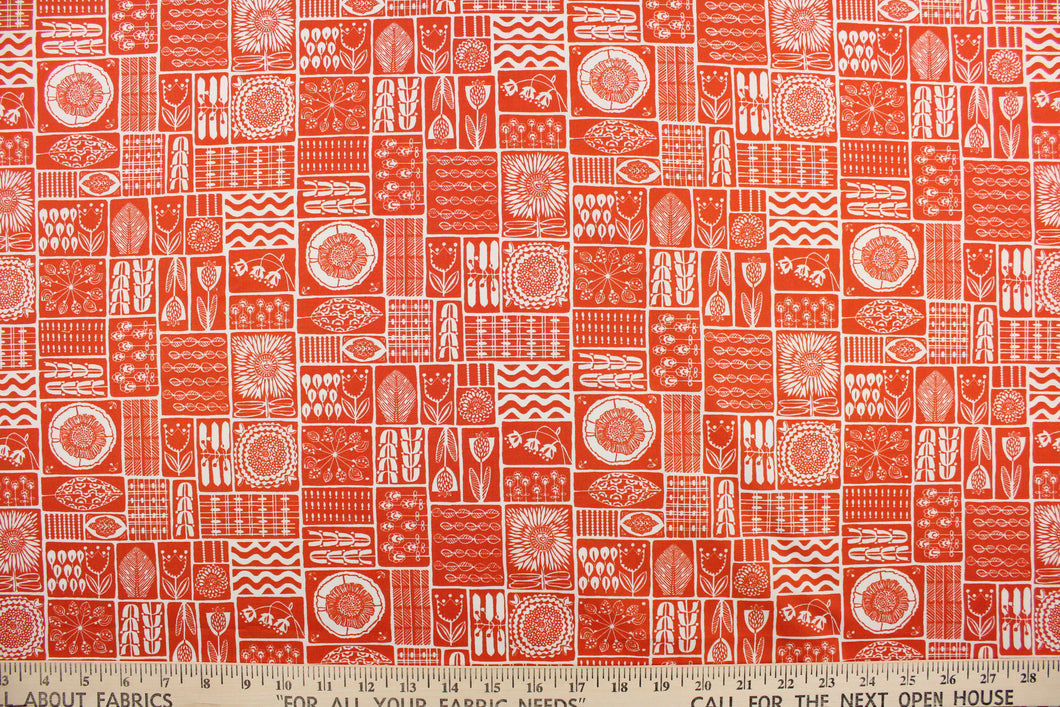 This fabric features a patchwork floral design in white on a orange background.  It has a nice soft hand and would be great for quilting, crafting and home decor.  