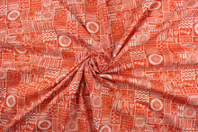 Load image into Gallery viewer, This fabric features a patchwork floral design in white on a orange background.  It has a nice soft hand and would be great for quilting, crafting and home decor.  
