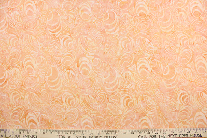  This fabric features seashells in apricot.  It has a nice soft hand and would be great for quilting, crafting and home decor.  We offer this fabric in one other color.