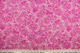 This fabric features butterflies in beige on a dark pink background.  It has a nice soft hand and would be great for quilting, crafting and home decor.  
