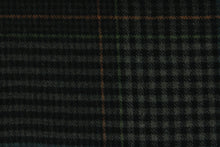 Load image into Gallery viewer, This multi use wool features a plaid design in ebony black, gray, blue and orange and is great for cooler weather.  It has a great hand and is hard-wearing.  The durability and wrinkle resistance makes it perfect for suits, jackets, overcoats, dresses, drapery and upholstery projects.
