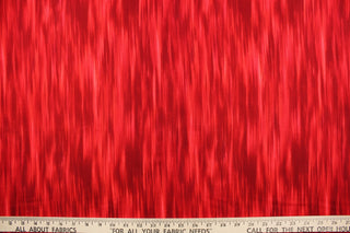 This fabric features stripes in varying shades of red that blend together to create a beautiful color palette.  It has a nice soft hand and would be great for quilting, crafting and home decor.  We offer this pattern in several different colors.