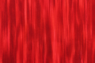 This fabric features stripes in varying shades of red that blend together to create a beautiful color palette.  It has a nice soft hand and would be great for quilting, crafting and home decor.  We offer this pattern in several different colors.