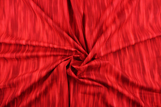 This fabric features stripes in varying shades of red that blend together to create a beautiful color palette.  It has a nice soft hand and would be great for quilting, crafting and home decor.  We offer this pattern in several different colors.