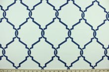 Load image into Gallery viewer, Lariat is an embroidered fabric that features an embossed trellis design in in navy blue and white.  Uses include light upholstery, pillows, bedding and window treatments.  
