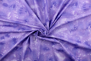 This fabric features ferns with a distressed look that enhances the design.  Colors included are various shades of violet with hints of white.  It has a nice soft hand and would be great for quilting, crafting and home decor.  
