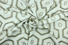 Load image into Gallery viewer, Leigh is an embroidered fabric that features an embossed geometric design in in taupe on a natural background.  Uses include drapery, upholstery, pillows and bedding.
