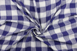 This fabric features a plaid design in purple and white.  It has a nice soft hand and would be great for quilting, crafting and home decor.  We offer this fabric in several different colors.