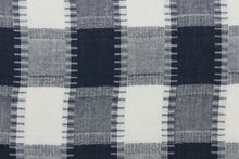 Load image into Gallery viewer, This fabric features a plaid design in dark blue, grey and white.  It has a nice soft hand and would be great for quilting, crafting and home decor.  We offer this fabric in several different colors.
