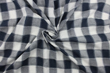 Load image into Gallery viewer, This fabric features a plaid design in dark blue, grey and white.  It has a nice soft hand and would be great for quilting, crafting and home decor.  We offer this fabric in several different colors.
