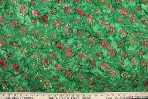 This fabric features small flowers in red, light pink, dark green, brown and light purple on a green background.  It has a nice soft hand and would be great for quilting, crafting and home decor.  