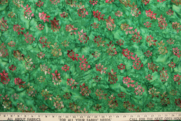 This fabric features small flowers in red, light pink, dark green, brown and light purple on a green background.  It has a nice soft hand and would be great for quilting, crafting and home decor.  