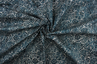 This fabric features a variety of large seashells in light gray on a navy blue background.  It has a nice soft hand and would be great for quilting, crafting and home decor.  