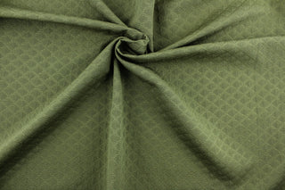 Concentric is a multi use, textured jacquard featuring a diamond design in sage green.  It is great for home décor such as upholstery, window treatments, pillows, duvet covers, tote bags and more.  It has a soft workable feel yet is stable and durable.  