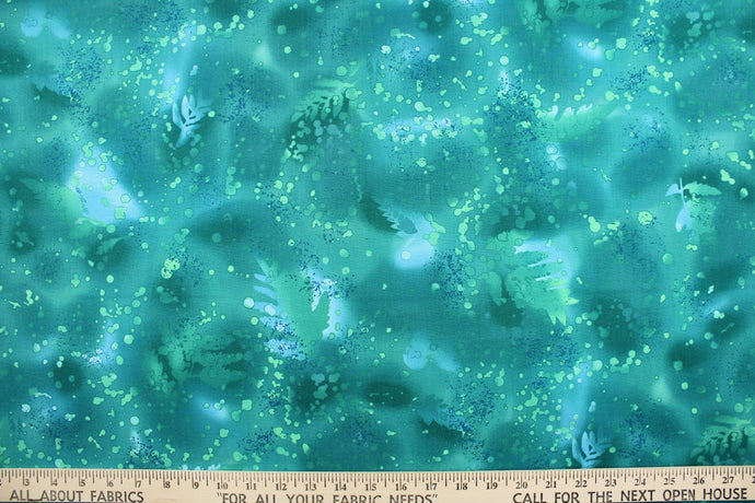 This fabric features ferns with a distressed look that enhances the design.  Colors included are various shades of green and blue with hints of light blue.  It has a nice soft hand and would be great for quilting, crafting and home decor.  We offer this fabric in several different colors.