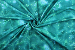 This fabric features ferns with a distressed look that enhances the design.  Colors included are various shades of green and blue with hints of light blue.  It has a nice soft hand and would be great for quilting, crafting and home decor.  We offer this fabric in several different colors.