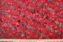 Load image into Gallery viewer, This fabric features small flowers in  dark green on a red background.  It has a nice soft hand and would be great for quilting, crafting and home decor.  
