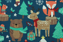 Load image into Gallery viewer, This fun Christmas print features forest animals with trees, presents, stockings and snowflakes.  Colors included are red, white, green, grey, beige, brown, orange and yellow.  It has a nice soft hand and would be great for quilting, crafting and home décor.  
