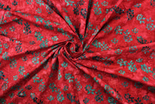 Load image into Gallery viewer, This fabric features small flowers in  dark green on a red background.  It has a nice soft hand and would be great for quilting, crafting and home decor.  
