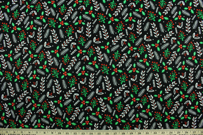 This cotton print fabric features Christmas holly and tinsel.  Colors included are red, white, green and black.  It has a nice soft hand and would be great for quilting, crafting and home décor.  