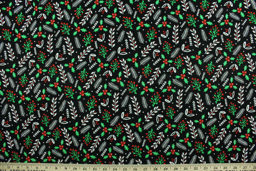 This cotton print fabric features Christmas holly and tinsel.  Colors included are red, white, green and black.  It has a nice soft hand and would be great for quilting, crafting and home décor.  