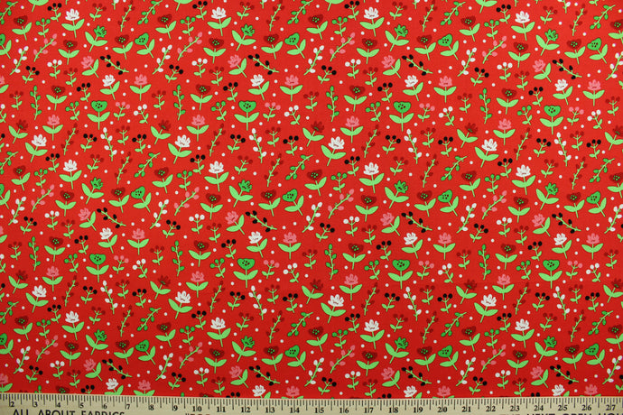 This cotton print fabric features dainty flowers in the colors of red, pink, green and white on a red background.  It has a nice soft hand and would be great for quilting, crafting and home décor.  