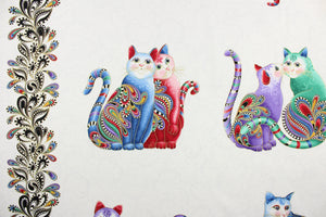  This fabric features multi colored playful cats and a paisley design with gold metallic accents on a white background with light gray swirls. It has a nice soft hand and would be great for quilting, crafting and home decor.  Colors included are purple, red, green, black, pink, blue and mustard yellow.