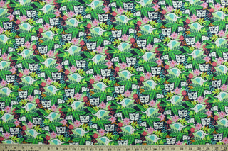 This cotton print fabric features cute baby elephants, tigers, and giraffe's with flowers and lush foliage,  Colors included are pink, green, white, black and orange.  It has a nice soft hand and would be great for quilting, crafting and home décor.  