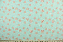 Load image into Gallery viewer, This cotton print fabric features a beautiful kaleidoscope of flowers in turquoise, orange and white.  It has a nice soft hand and would be great for quilting, crafting and home décor.  

