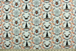This cotton print fabric features a Halloween design of fall flowers, spiders, bats and witch hats.  It has a nice soft hand and would be great for quilting, crafting and home decor.  