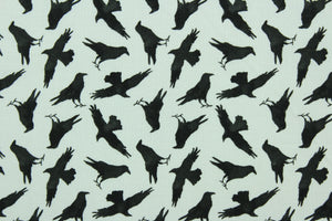 Murder of the Crows features black birds on a white background.  This lightweight fabric is easy to sew and has a soft hand.   The versatile fabric makes it great for quilting, crafting and home decor.