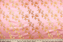 Load image into Gallery viewer, Elegant portrays this jacquard fabric which features intricate woven flowers in gold on a pink background.  Made of 100% polyester this fabric is durable, strong, and wrinkle resistant and has a luxurious feel.  This fabric would compliment any room whether you use it for drapery or throw pillows.  It is also perfect for upholstery, home décor, duvet covers and apparel. The possibilities are endless.  
