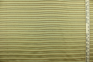 This rich woven yarn dyed fabric features a striped design in green, russet and golden beige.  Enhancing the color and texture of the stripes is a slight sheen.  Heavy weight and woven stripes make the 100% polyester fabric durable, strong and fade resistant.  This fabric would enrich any room whether you use it for light upholstery, throw pillows, drapery and home décor.