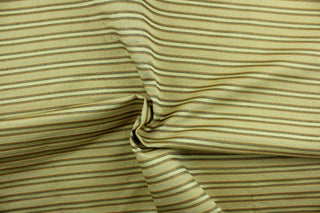 This rich woven yarn dyed fabric features a striped design in green, russet and golden beige.  Enhancing the color and texture of the stripes is a slight sheen.  Heavy weight and woven stripes make the 100% polyester fabric durable, strong and fade resistant.  This fabric would enrich any room whether you use it for light upholstery, throw pillows, drapery and home décor.