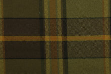 Load image into Gallery viewer,  Tartan features a plaid design in brown, yellow, orange, green and black. It is durable and hard wearing and would be great for light duty upholstery, accent pillows and drapery. 
