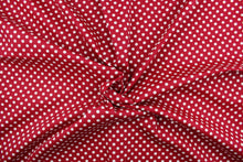 Load image into Gallery viewer, This fun fabric features white polka dots on a red background.  It has a nice soft hand and would be great for quilting, crafting, apparel and home decor.  We offer this fabric in several other colors.
