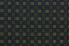 Load image into Gallery viewer,  Balanced is a multi use fabric featuring a square pattern in navy blue, champagne, brown and brick red.  It is durable and hard wearing and would be great for multi-purpose upholstery, bedding, accent pillows and drapery.  We offer this pattern in two other colors.
