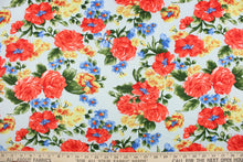 Load image into Gallery viewer, This fabric features a floral design in red, blue and yellow on a light blue background.  It is durable and breathable and will allow movements of the body.  Uses include dance and sports wear, leotards and dresses.  We offer several different lycra fabrics.   
