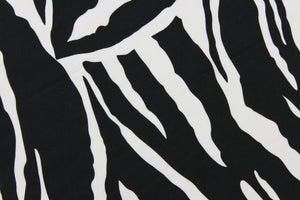 This fun fabric features a zebra print in black and white.  It has a nice soft hand and would be great for quilting, crafting, apparel and home decor.  The possibilities are endless.