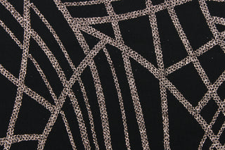 This 4 way stretch lycra blend fabric in black with rose gold sparkle accents is durable and breathable and will allow movements of the body. Uses include dance and sports wear, leotards and dresses.  We offer several different lycra fabrics.   