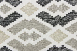 This jacquard fabric features a large scale aztec theme with chenille woven in for luxurious softness.  It can be used for multi purpose upholstery, heavy drapery, pillows, cushions and ottomans.  Colors included are black, white and brown.