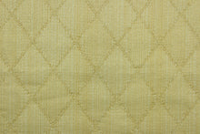 Load image into Gallery viewer, Prismatic is a quilted fabric design in lemon yellow.  It is durable and hard wearing and would be great for multi-purpose upholstery, bedding, accent pillows and drapery.  We offer this fabric in several different colors.

