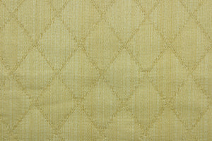 Prismatic is a quilted fabric design in lemon yellow.  It is durable and hard wearing and would be great for multi-purpose upholstery, bedding, accent pillows and drapery.  We offer this fabric in several different colors.