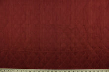 Load image into Gallery viewer, Prismatic is a quilted fabric design in ruby red.  It is durable and hard wearing and would be great for multi-purpose upholstery, bedding, accent pillows and drapery.  We offer this fabric in several different colors.
