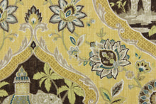 Load image into Gallery viewer,  This fabric is screen printed on cotton duck and is very versatile.  It has a medallion design featuring elephants and palm trees with a floral background. It is perfect for window treatments (draperies, valances, curtains, and swags), bed skirts, duvet covers, pillow shams, accent pillows, tote bags, aprons, slipcovers and upholstery. Colors include yellow, grey, brown, green and teal.
