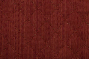 Prismatic is a quilted fabric design in ruby red.  It is durable and hard wearing and would be great for multi-purpose upholstery, bedding, accent pillows and drapery.  We offer this fabric in several different colors.
