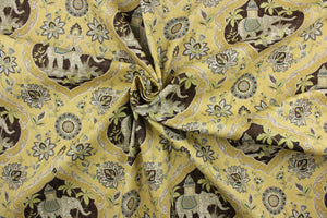  This fabric is screen printed on cotton duck and is very versatile.  It has a medallion design featuring elephants and palm trees with a floral background. It is perfect for window treatments (draperies, valances, curtains, and swags), bed skirts, duvet covers, pillow shams, accent pillows, tote bags, aprons, slipcovers and upholstery. Colors include yellow, grey, brown, green and teal.