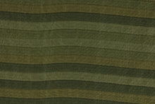 Load image into Gallery viewer,  This rich woven yarn dyed fabric features a striped design in shades of green.  Enhancing the color and texture of the stripes is a slight sheen.  Heavy weight and woven stripes make the 100% polyester fabric durable, strong and fade resistant.  This fabric would enrich any room whether you use it for upholstery, throw pillows or home décor.
