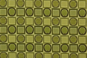 This multi use fabric features a retro design in peridot.  It is durable and hard wearing and would be great for multi-purpose upholstery, bedding, accent pillows and drapery. 